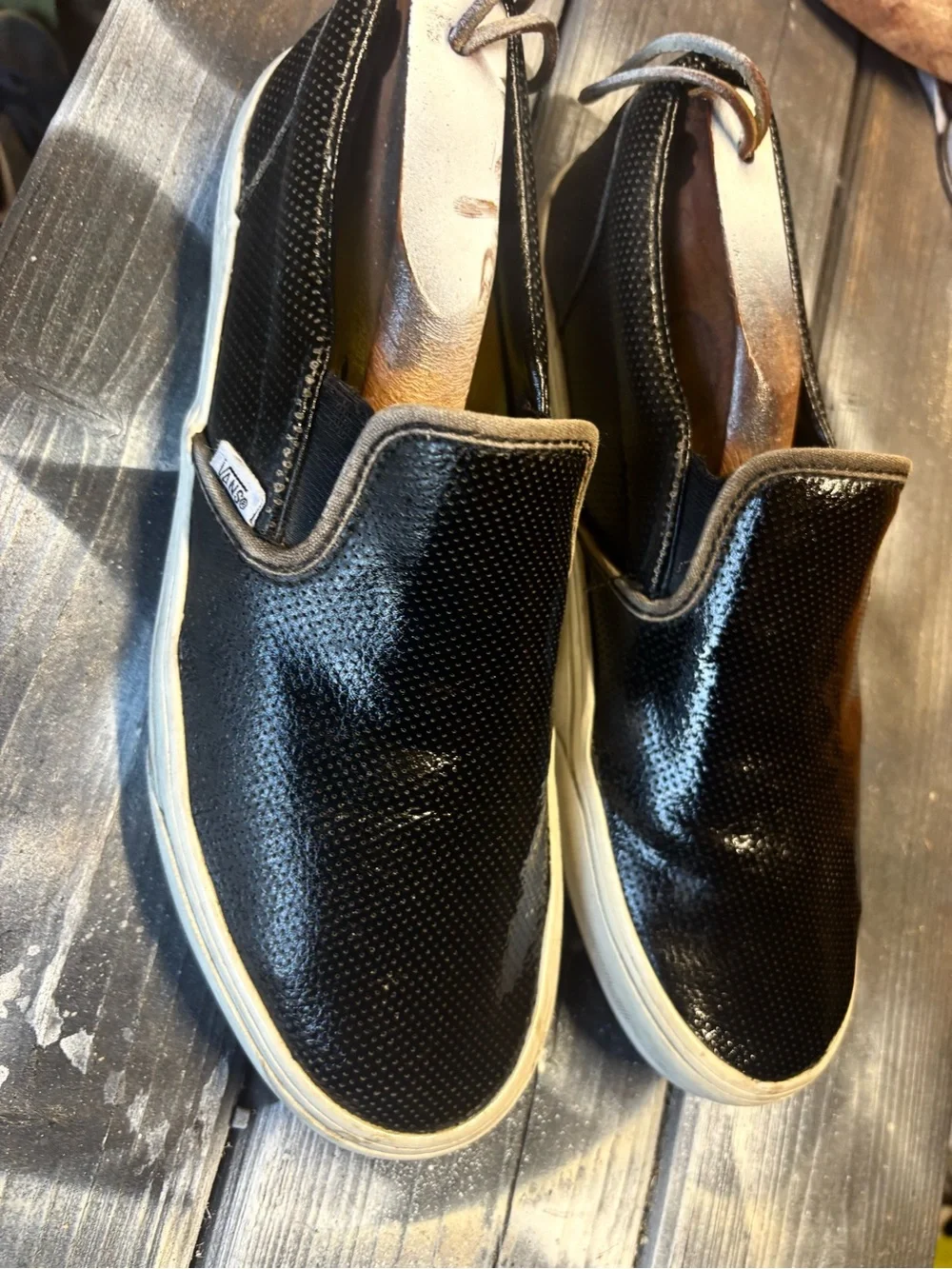 Vans black slip-on sneakers with textured perforated surface Mens 10